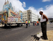 Shakier Gafieldien, 86, looks on in February 2016 as former District Six residents march down Keizersgracht, once Hanover Street, with a float depicting the area’s demolished neighbourhoods. 