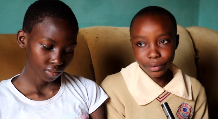 Marion Nekesa (right) with her school colleague who had visited her.