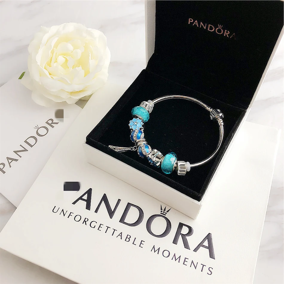 Bracelet Rond Diamant Cristal Transparent Bleu Glacier Plaqué Argent Un bijou étincelant pour un look élégant et raffiné.