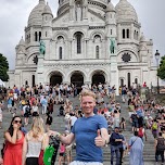 touring through Paris on a LIME scooter, at the Sacre-Ceour in Paris, France 