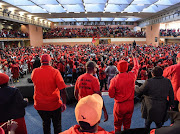 EFF leader Julius Malema, flanked by deputy president Floyd Shivambu and secretary general Godrich Gardee, addresses Fort Hare University students on June 16.