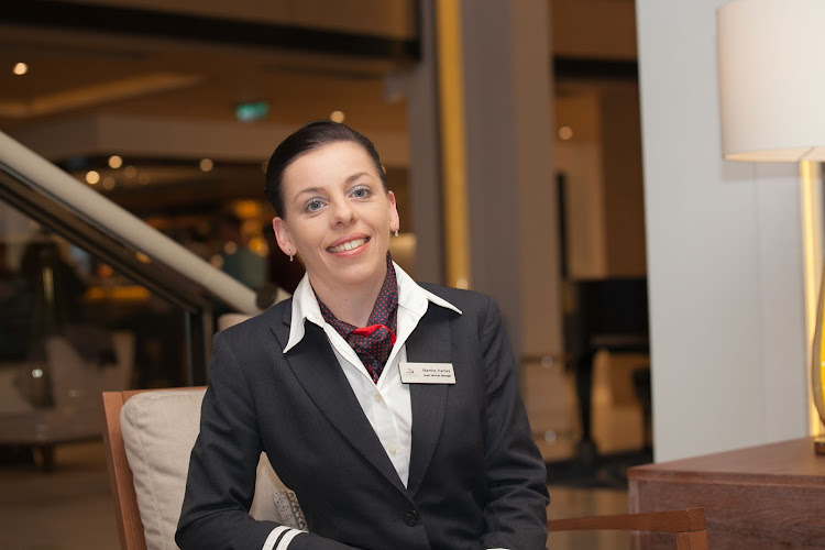 Martha Hanley, guest services manager of Viking Star, in the Atrium outside the Explorers Desk.