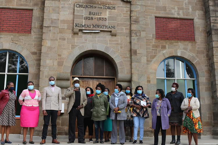 Officials of education, gender, culture and social services department of the Kiambu county government outside Church of the Torch in Thogoto, Kikuyu. The chapel was gazzetted as a National Monument in 2008 by the Museums of Kenya.