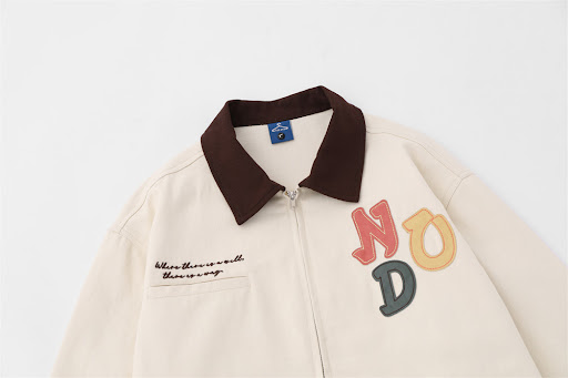 Title 12, Denim jacket featuring color letter veneer, emb...