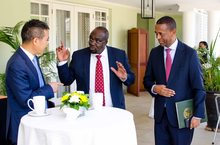 China Ambassador to Kenya Zhou Pingijian, API chief executive Peter Kagwanja, and IGAD Special Envoy for the Red Sea, Gulf of Aden and Somalia Mohamed Ali Guyo during a seminar on the peace and stability of the Horn of Africa on Thursday October 13, 2022