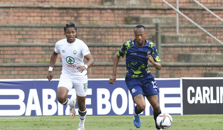 Thabo Mnyamane of Marumo Gallants challenges Siyethemba Sithebe of AmaZulu during their DStv Premiership match at King Zwelithini Stadium on November 4 2021 in Durban.