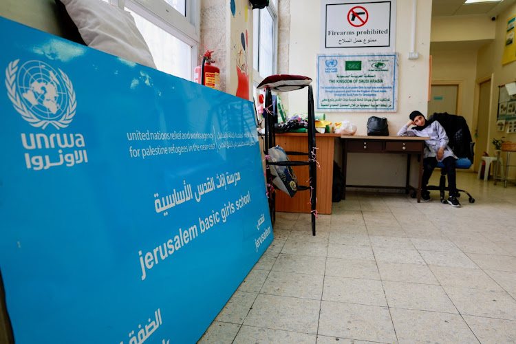 A Palestinian girl waits by the entrance to the UNRWA Jerusalem Girls' School in the Silwan neighbourhood of East Jerusalem on January 30 2024. Picture: REUTERS/Ammar Awad