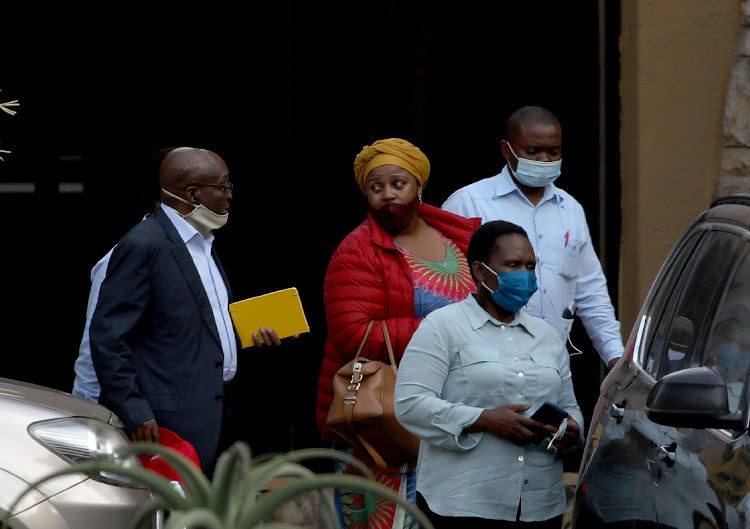 Former president Jacob Zuma walks with Dudu Myeni as he leaves Sibaya Casino in Durban after a meeting. File photo.