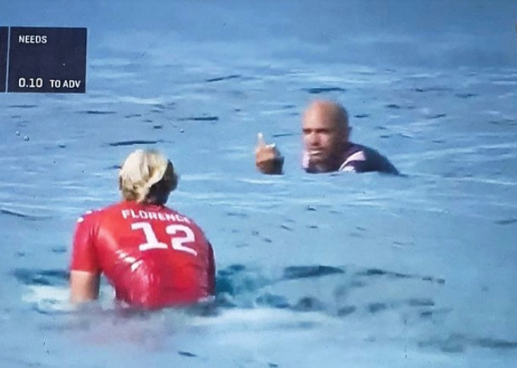 Kelly Slater flips off John Florence