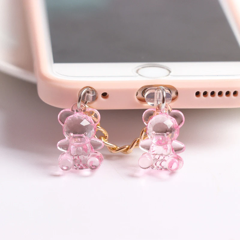 Plugue de poeira fofo para orifício de fone de ouvido com orelhas de urso de acrílico estéreo. Proteja seu celular com estilo e fofura!