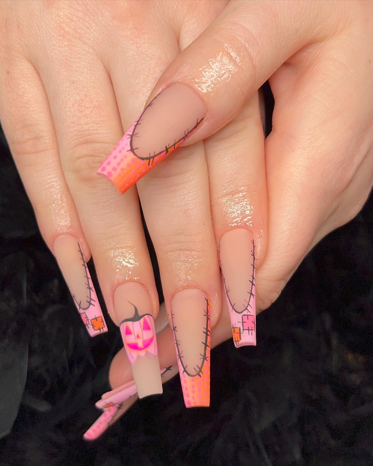 Pink And Orange Stich Nails