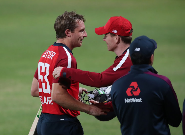 England vice-captain Jos Buttler celebrates with teammates after winning the third Twenty20 match against South Africa to complete a 3-0 whitewash away from home.
