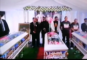 The embellished coffins of the Kalicharan family, laid to rest on Sunday after they were killed in a drive-by shooting last week.