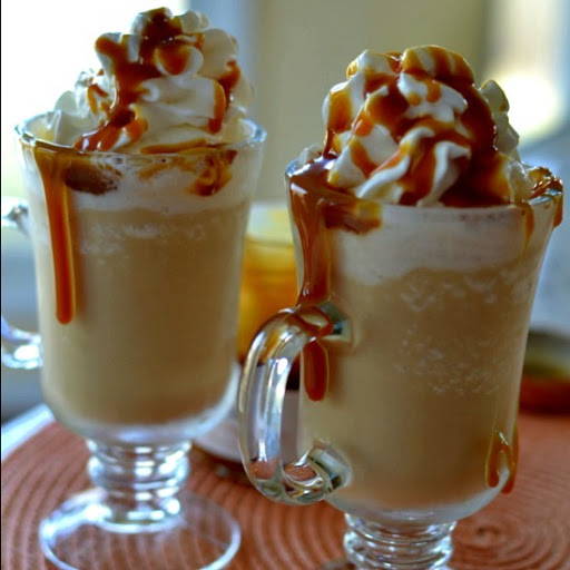 This delectable five minute Caramel Frappucciono will make a fru fru coffee drinker out of you in no time.  Drink it virgin style or spike it up with baileys, kahlua or rumchata.