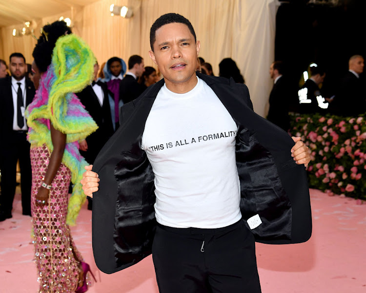 Trevor Noah wearing a T-shirt reading 'This is all a formality' at the 2019 Met Gala.