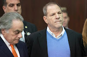 Film producer Harvey Weinstein stands with his lawyer Benjamin Brafman (L) inside Manhattan Criminal Court during his arraignment in Manhattan in New York, US, May 25, 2018. 