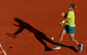 Rafael Nadal plays a forehand against Felix Auger-Aliassime of Canada in their French Open fourth round match at Roland Garros  in Paris on May 29 2022.