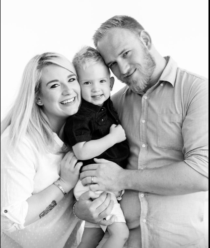 Morgan Brink with her husband and son. Morgan is just over five months pregnant and has tested positive for Covid-19.