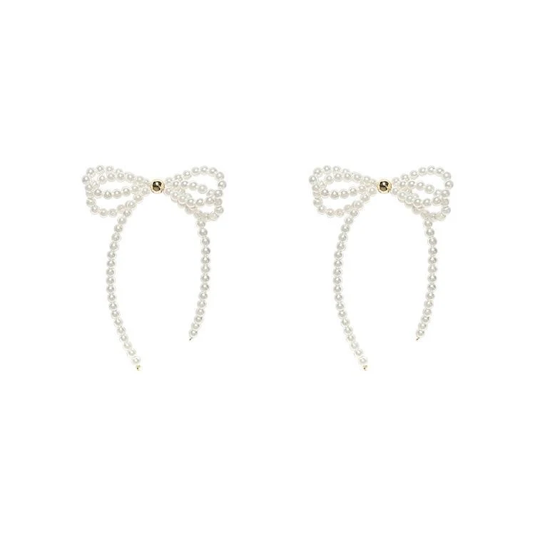 Tassel oorstekers met parelboog voor dames. Elegante sieraden voor vrouwen. Perfecte accessoires voor dagelijks gebruik en speciale gelegenheden.