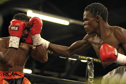 Ayanda Nkosi hits Ricardo Hiraman in a previous bout .