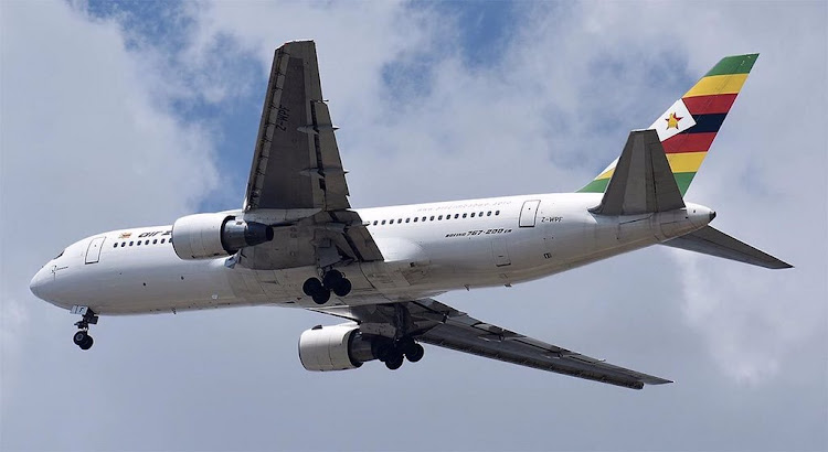 An Air Zimbabwe passenger plane suffered a "malfunction" in one of its engines after flying out of South Africa's main international airport.