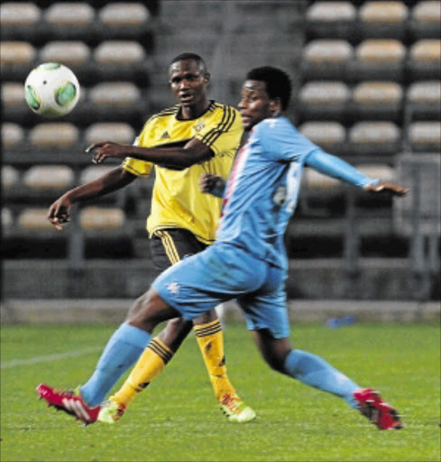 PRESSURE: Thobani Mncwango of Polokwane City and Thibang Phete of Milano PHOTO: Petri Oeschger/BackpagePix