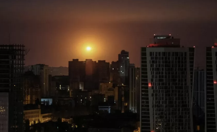 An explosion in the sky over Kyiv during a Russian drone and missile strike