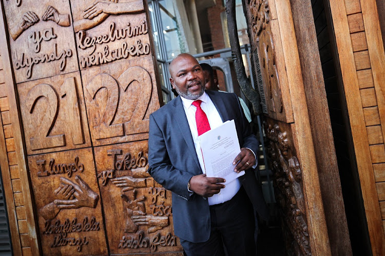 Former NPA head Mxolisi Nxasana talks to journalists at the Constitutional Court in Johannesburg on August 13 2018. The court ruled that the appointment of Shaun Abrahams as NPA head was unconstitutional and invalid.