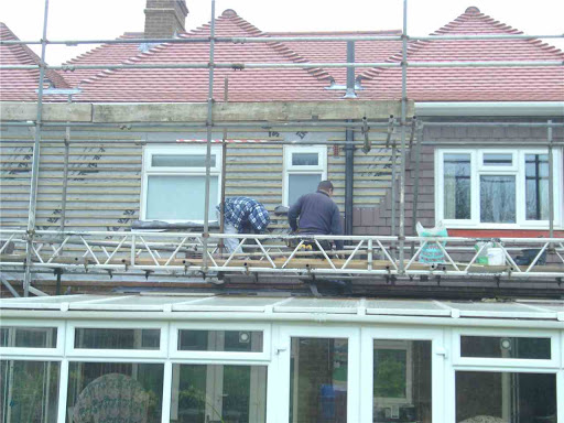 main roof,verticle tile hanging,upvc facias  gutters