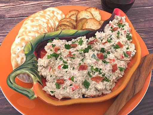 A delicious clam-cheese spread served with crackers.