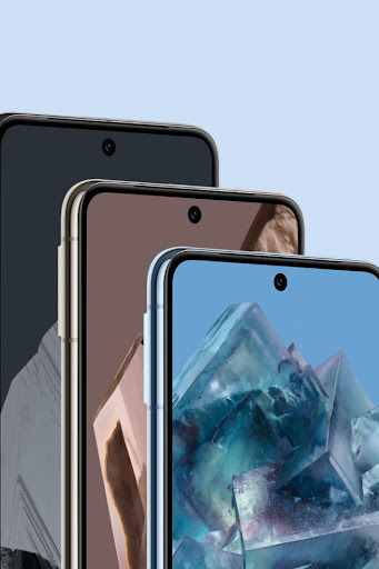 Three Pixel 8 Pros in various Colours. They stand behind one another. Their homescreens are on, showing off the smooth, scratch-resistant glass.