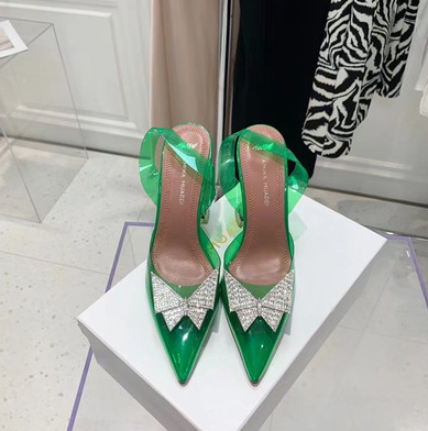 Women's PVC transparent bow pointed toe sandals, stylish and comfortable, perfect for summer fashion and elegant looks.