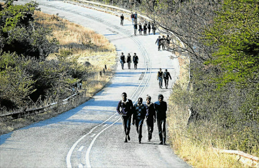 STILL WALKING: Despite some improvements in Eastern Cape schools, pupil transport remains a problem for the department Picture: Michael Pinyana