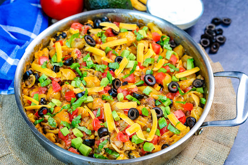 Cheesy Taco Skillet with toppings added.