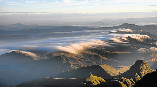 Clouds drape the Drakensberg escarpment.