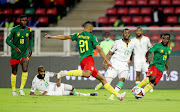 Cameroon's Jean-Charles Castelletto takes a shot at goal during their 2-1 Afcon last-16 win over Comoros.