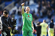 Aaron Ramsdale of Arsenal acknowledges the fans after his sides victory in the Premier League match between Leicester City and Arsenal at The King Power Stadium on October 30, 2021 in Leicester, England.