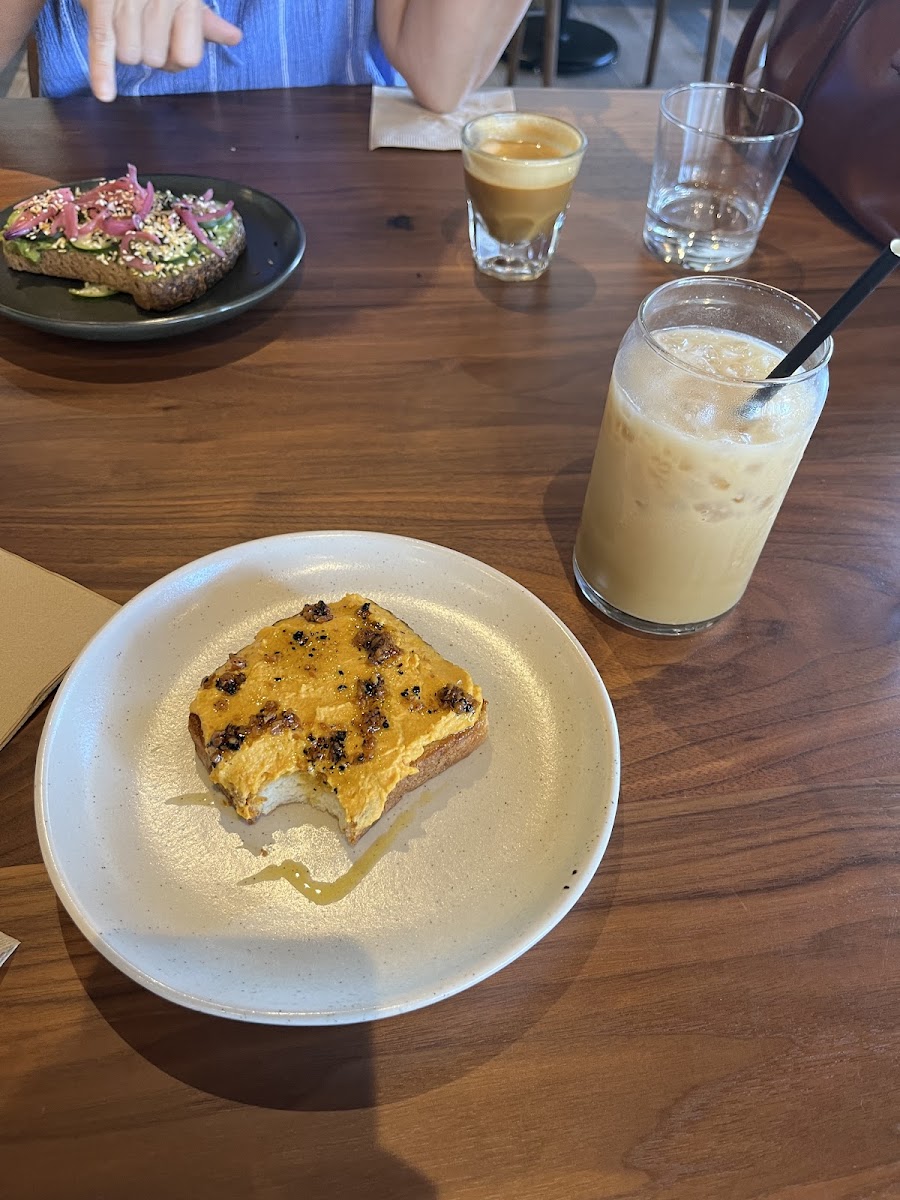 Carrot hummus toast with a chili garlic oil