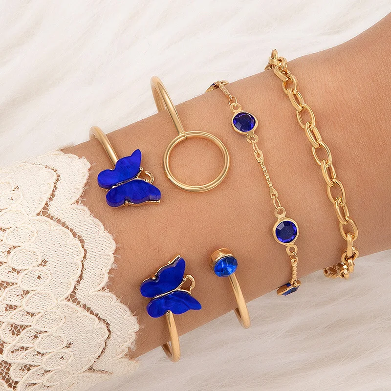 Blauwe vlinder diamanten holle vierlaagse armband, een elegant sieraad dat elke outfit verfraait en je pols laat stralen.