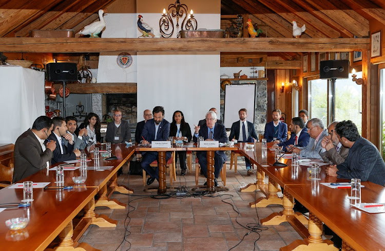 Martin Griffiths, United Nations Special Envoy for Yemen, and Fabrizio Carboni, Regional Director for the Near and Middle East of the International Committee of the Red Cross (ICRC), attend the closing plenary of the fourth meeting of the Supervisory Committee on the Implementation of the Prisoners' Exchange Agreement in Yemen, in Glion, Switzerland, September 27, 2020.