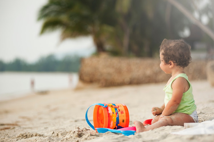 NO-TECH ZONE: The beach is for buckets and spades, not computer tablets