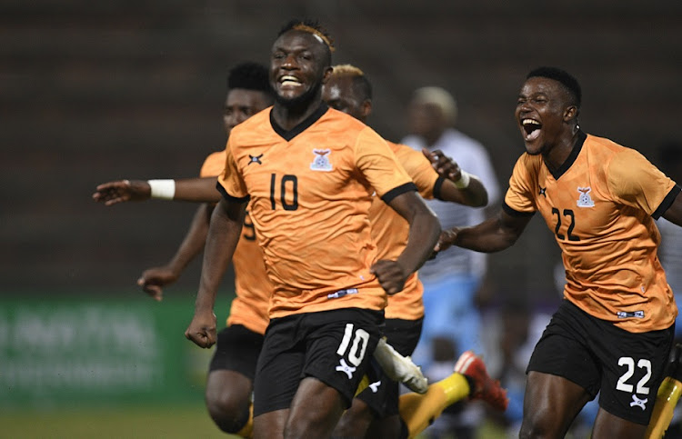 Zambian players Ricky Banda and Enock Sakala celebrate their win against Botswana in their Cosafa Cup quarterfinal at King Zwelithini Stadium in Umlazi on July 12 2022.