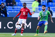 Percy Tau, left, and Alex Roldan during the Fifa Club World Cup Morocco 2022 second round match between Al Ahly and Seattle Sounders FC at Morocoo's Ibn Batouta Stadium on February 4 2023.