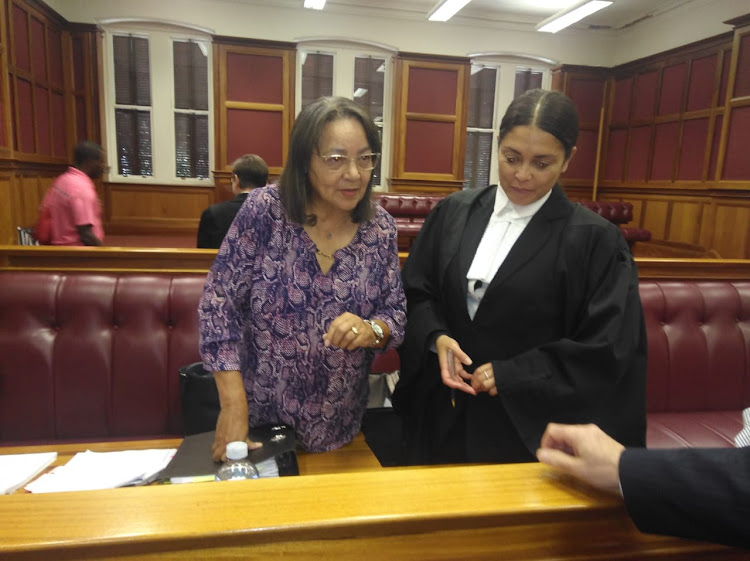 Good leader Patricia de Lille talks to her lawyers in the high court in Cape Town on April 26 2019.