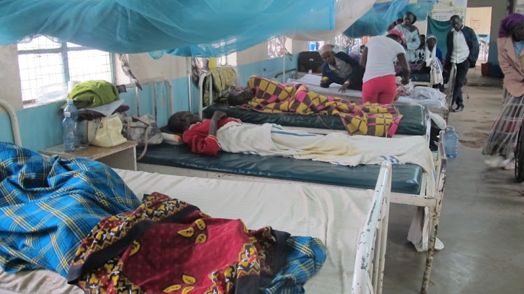 Patients in a ward in Awendo subcounty hospital