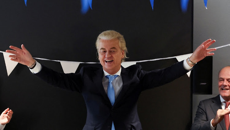 Dutch far-right politician and leader of the PVV party Geert Wilders greets supporters at the Dutch parliament, after the Dutch parliamentary elections, in The Hague, Netherlands November 23 2023. Picture: YVES HERMAN/REUTERS