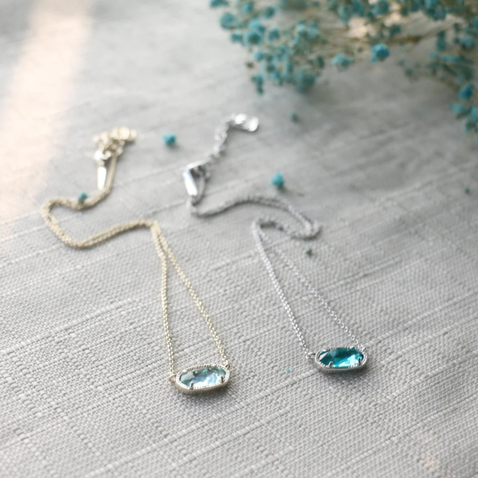 Dames elegante halsketting, ovaal geometrisch design, transparant oceaanblauw glas, een modieus sieraad voor elke outfit.