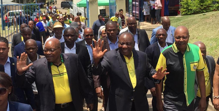 ANC president Cyril Ramaphosa and former president Jacob Zuma greet members of the community whilst on their way up to the wreath laying ceremony at Ohlange Institute in Inanda, north of Durban.