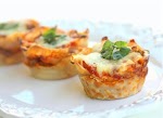 Lasagna Cupcakes was pinched from <a href="http://www.tablespoon.com/recipes/lasagna-cupcakes-recipe/1/" target="_blank">www.tablespoon.com.</a>