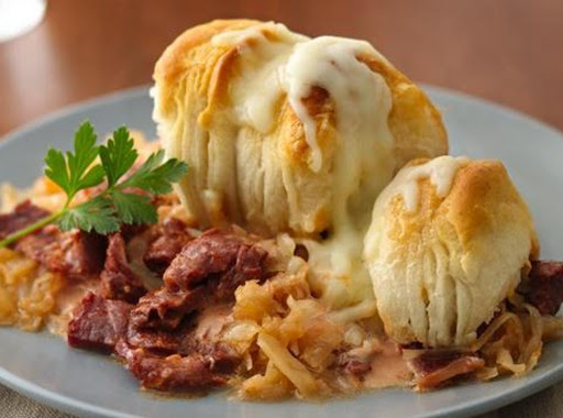 Pillsbury® Grands!® Jr. Golden Layers® biscuits provide an easy topping to this cheesy pot pie that's made using corned beef and sauerkraut - a perfect casserole dinner.

